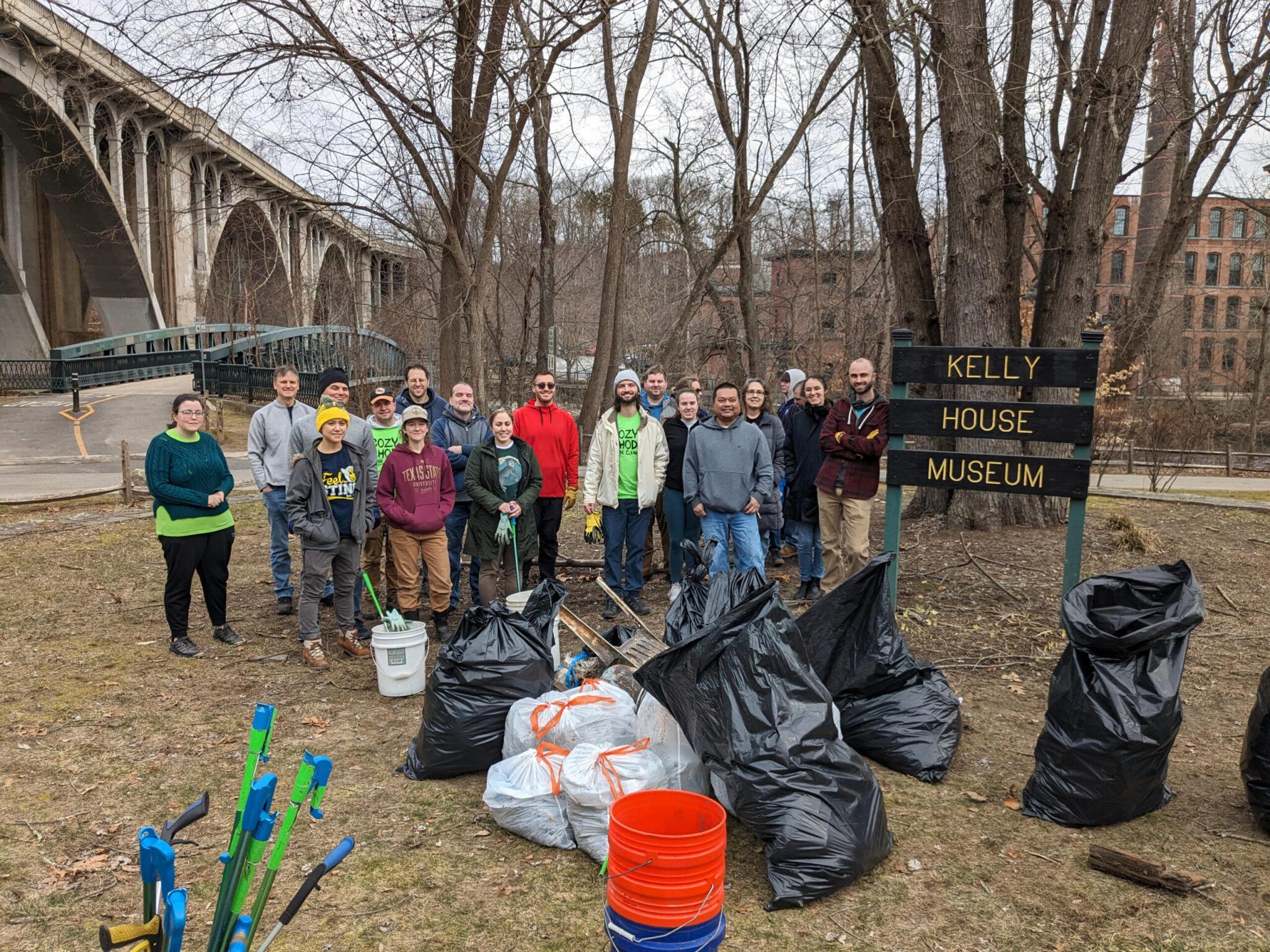 Cozy-Rhody-volunteers Volunteers cleaning park near Kelly House Museum for Blackstone River Watershed Council event.